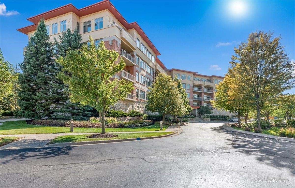 45 Prairie Park Drive, Unit 501 Wheeling, IL 60090 - Photo 3 of 30 a view of a house with a swimming pool