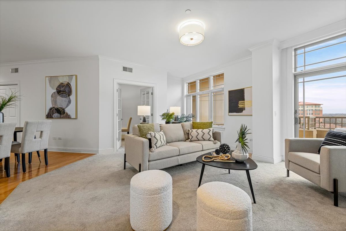 45 Prairie Park Drive, Unit 501 Wheeling, IL 60090 - Photo 6 of 30 a living room with furniture and a large window