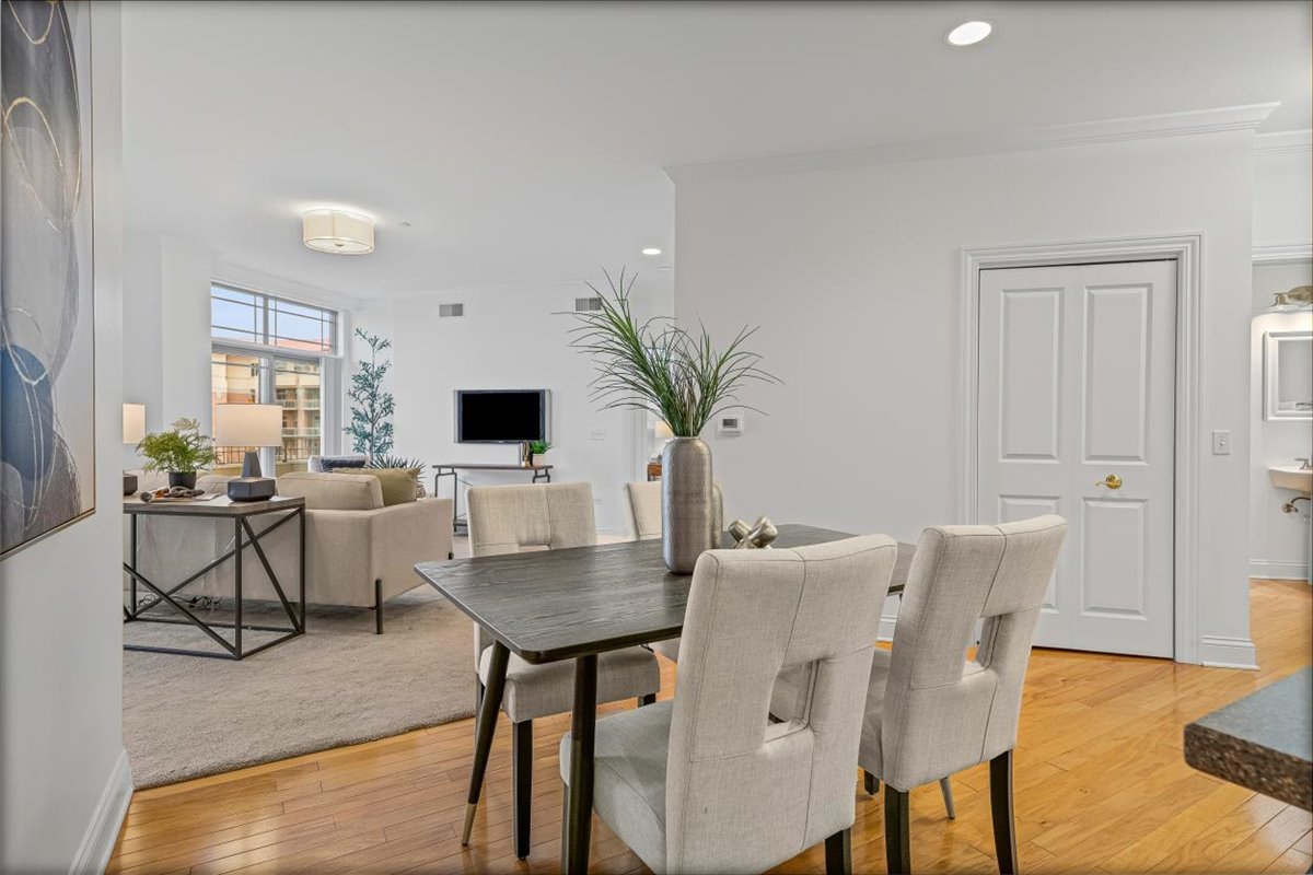 45 Prairie Park Drive, Unit 501 Wheeling, IL 60090 - Photo 7 of 30 a view of a dining room with furniture