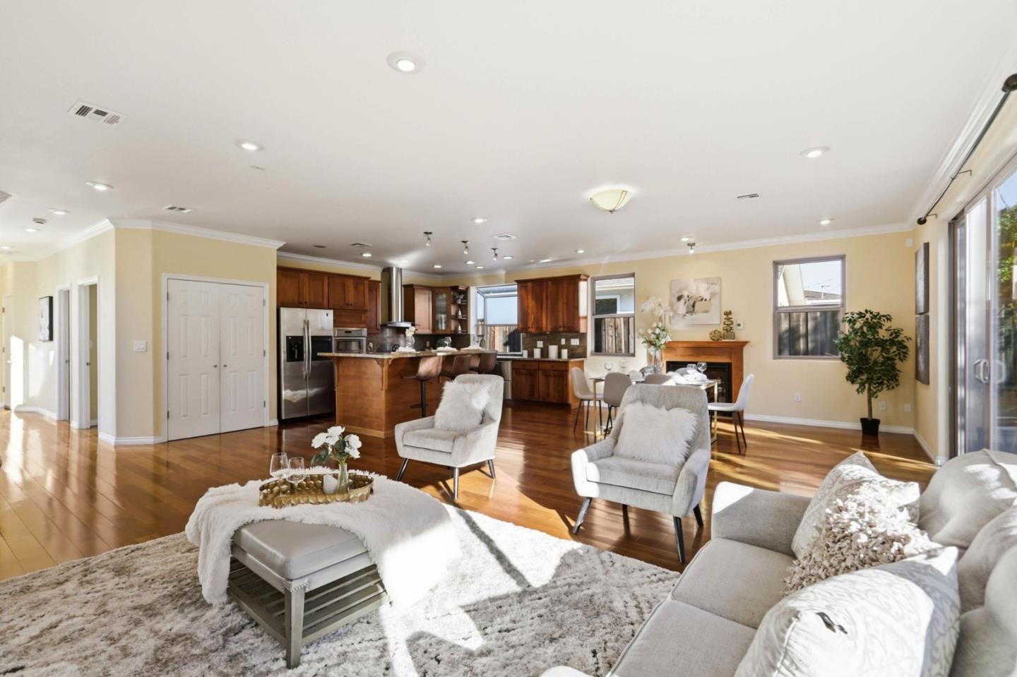 1352 South Stelling Road Cupertino, CA 95014 - Photo 14 of 49 a living room with lots of furniture and view of kitchen