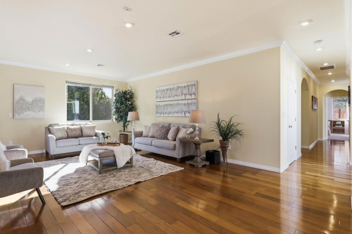 1352 South Stelling Road Cupertino, CA 95014 - Photo 22 of 49 a living room with furniture wooden floor and a large window