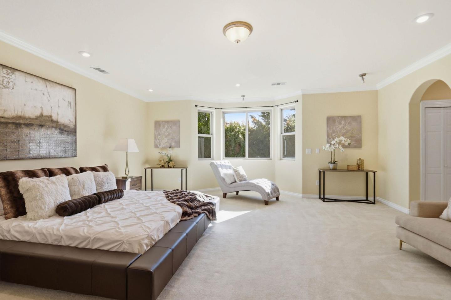 1352 South Stelling Road Cupertino, CA 95014 - Photo 23 of 49 a spacious bedroom with a bed and glass walk in closet