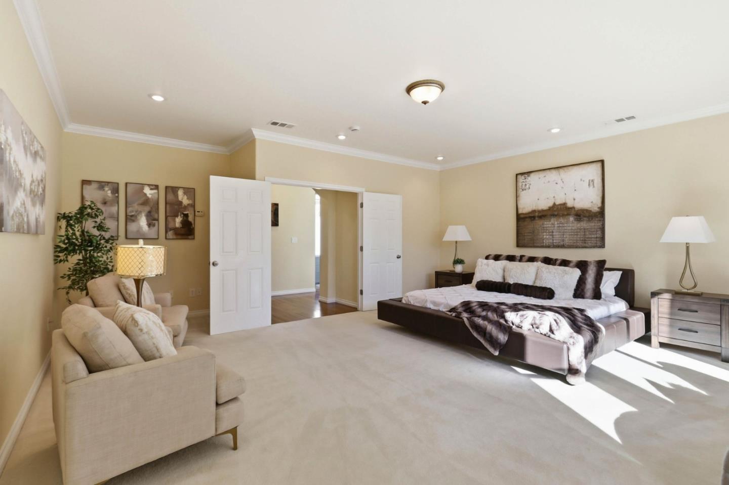 1352 South Stelling Road Cupertino, CA 95014 - Photo 26 of 49 a spacious bedroom with a bed and furniture