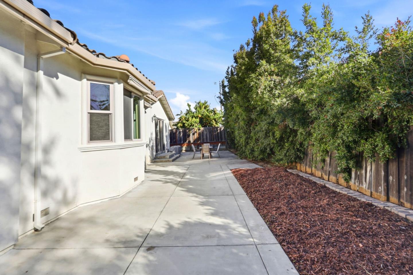 1352 South Stelling Road Cupertino, CA 95014 - Photo 46 of 49 a view of a yard with plants and a pathway