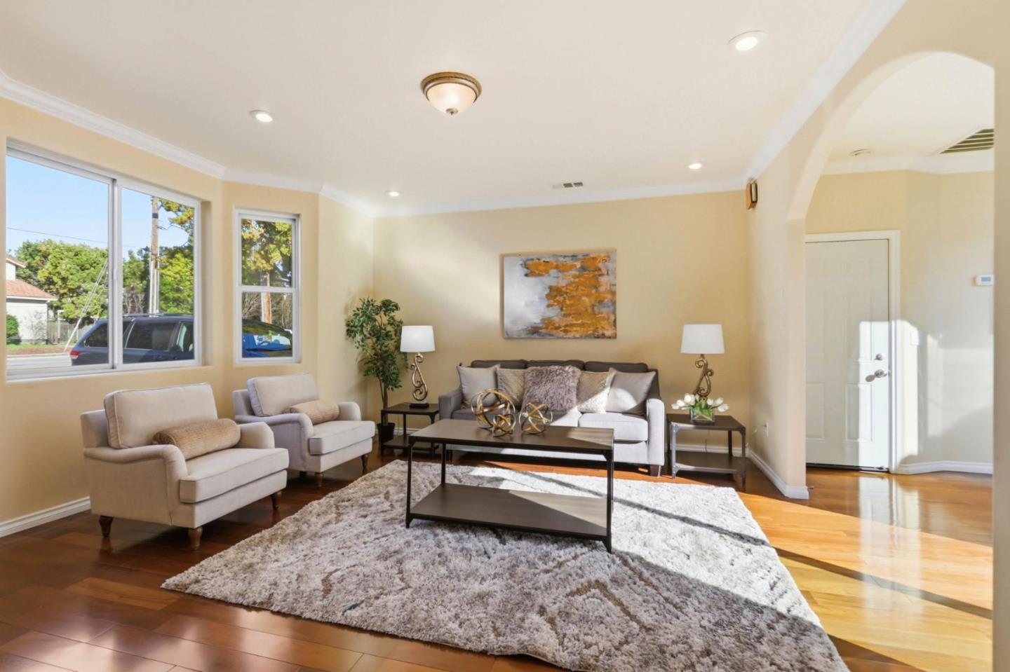 1352 South Stelling Road Cupertino, CA 95014 - Photo 8 of 49 a living room with furniture and a rug