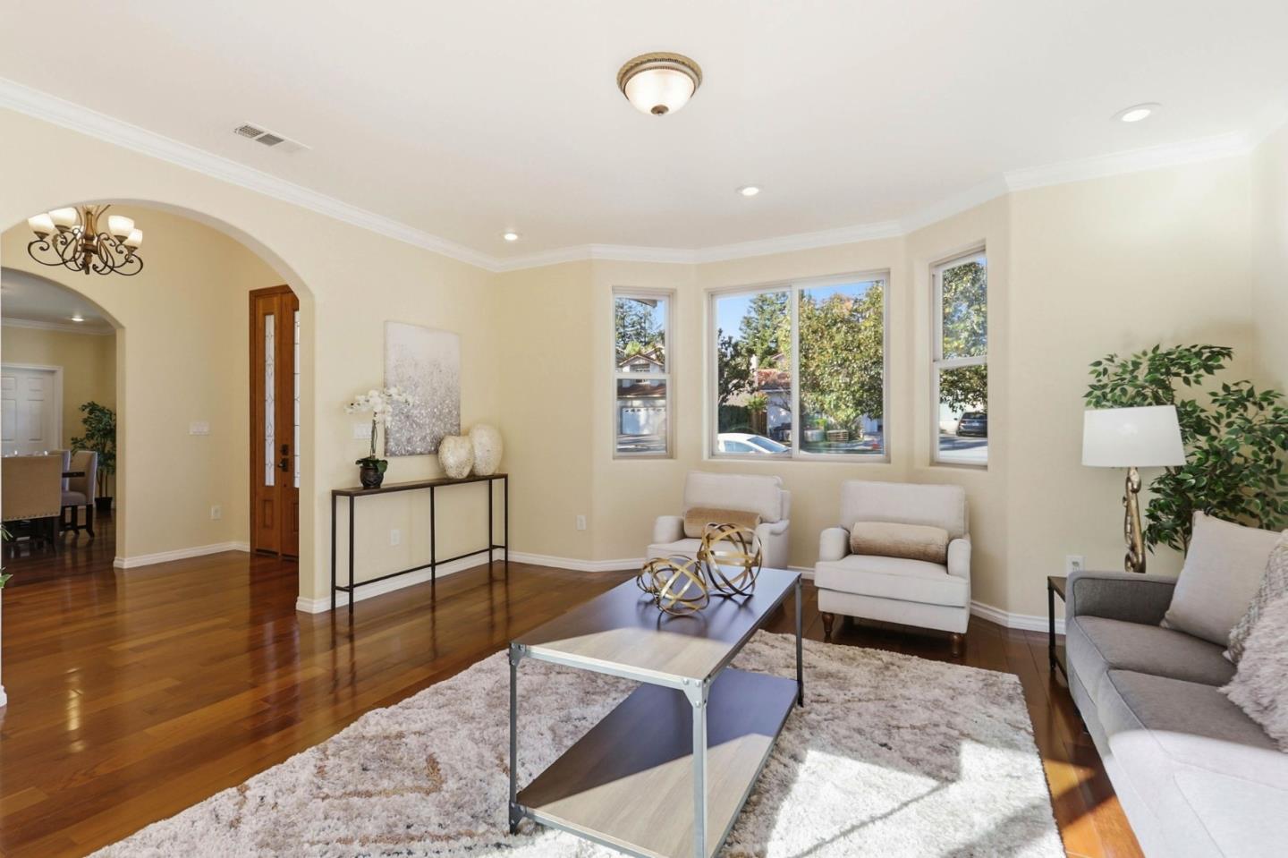 1352 South Stelling Road Cupertino, CA 95014 - Photo 9 of 49 a living room with furniture and a large window