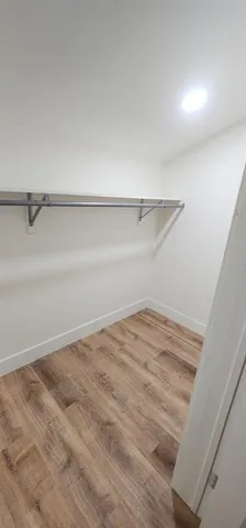 a view of a room with an empty space