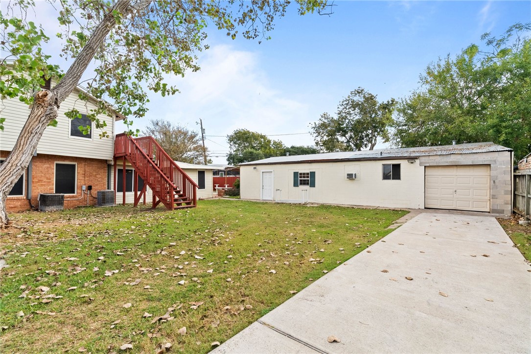 1225 Jonnell Street Corpus Christi, TX 78418 - Photo 33 of 39 a view of a house with a yard