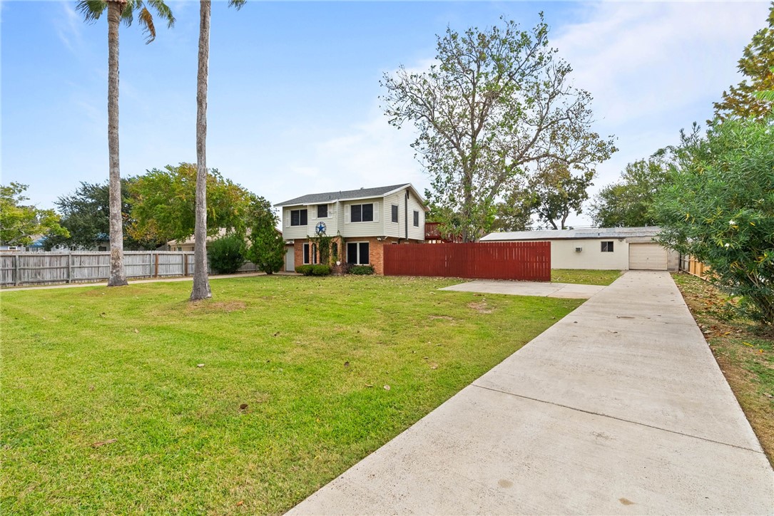 1225 Jonnell Street Corpus Christi, TX 78418 - Photo 4 of 39 a view of a house with a yard