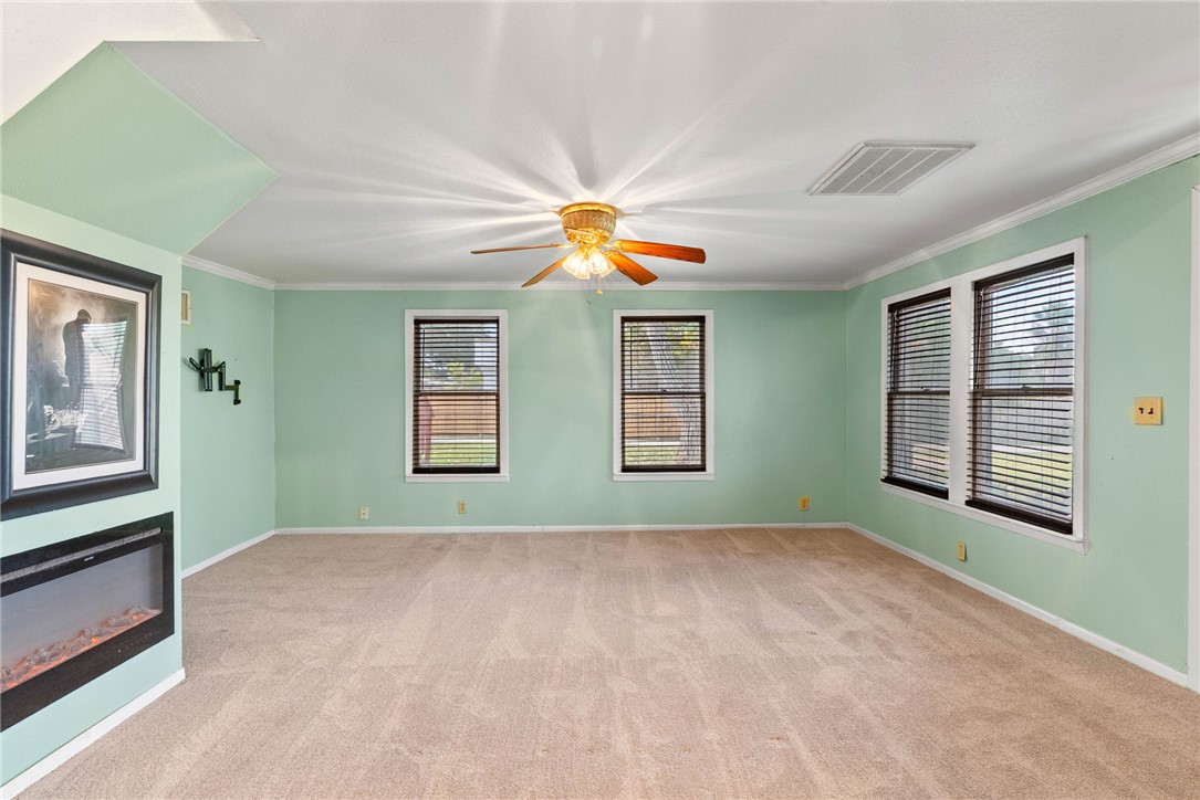 1225 Jonnell Street Corpus Christi, TX 78418 - Photo 6 of 39 a view of an empty room with a window