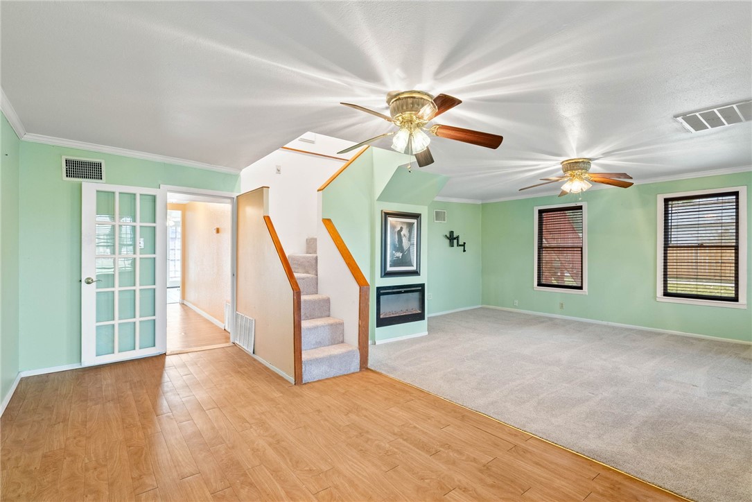 1225 Jonnell Street Corpus Christi, TX 78418 - Photo 7 of 39 a view of entryway and hall with a ceiling fan