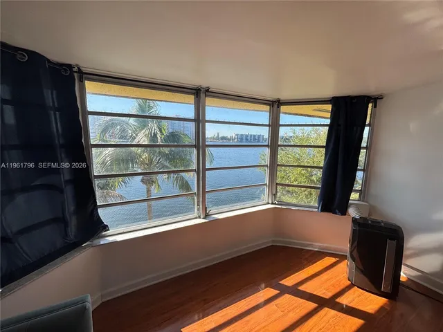 a view of a living room and a window