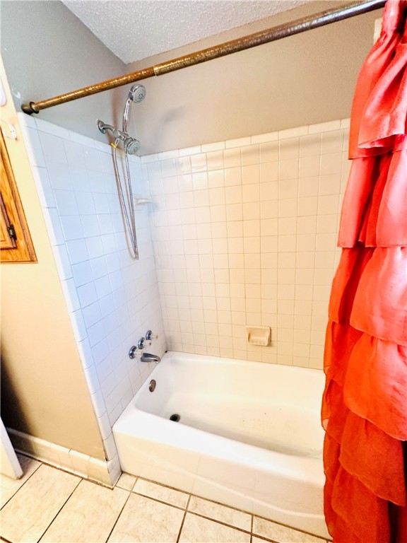 4725 Mable Street Corpus Christi, TX 78411 - Photo 11 of 21 a bathroom with a bathtub and a shower