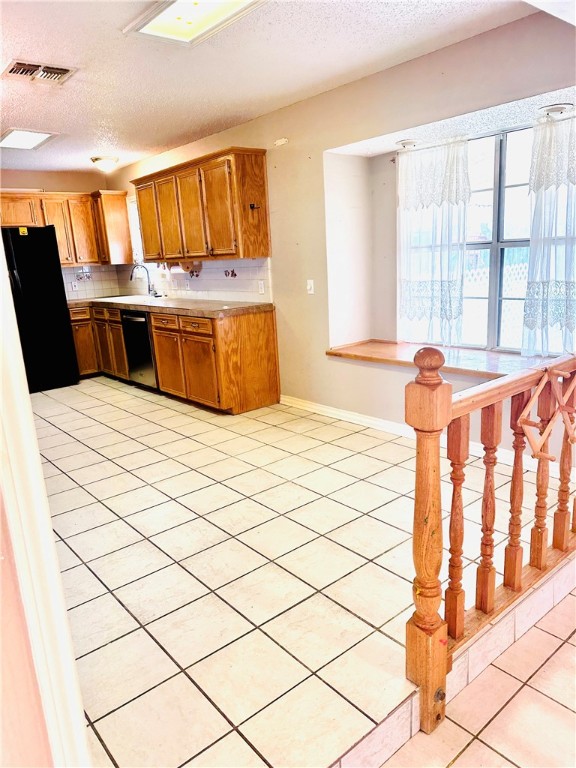 4725 Mable Street Corpus Christi, TX 78411 - Photo 14 of 21 a bedroom with a bed and washer dryer