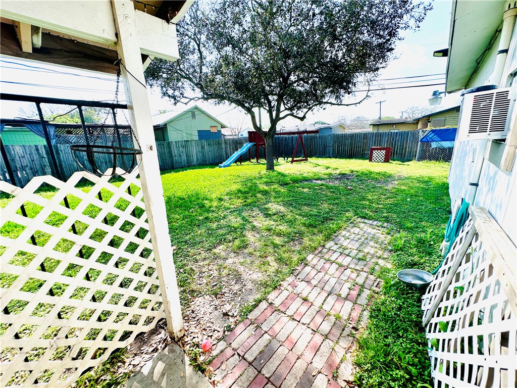 4725 Mable Street Corpus Christi, TX 78411 - Photo 17 of 21 a view of a house with a yard