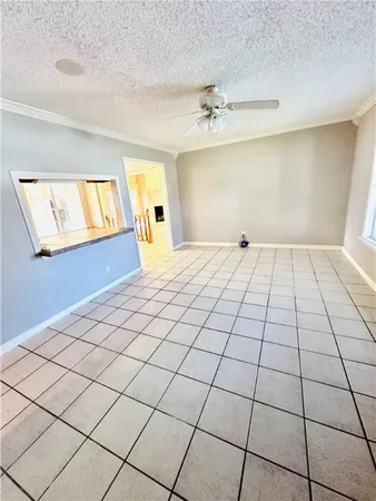 a view of an empty room and window