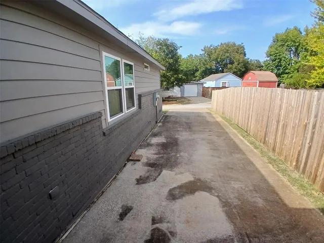 a view of a back yard of the house