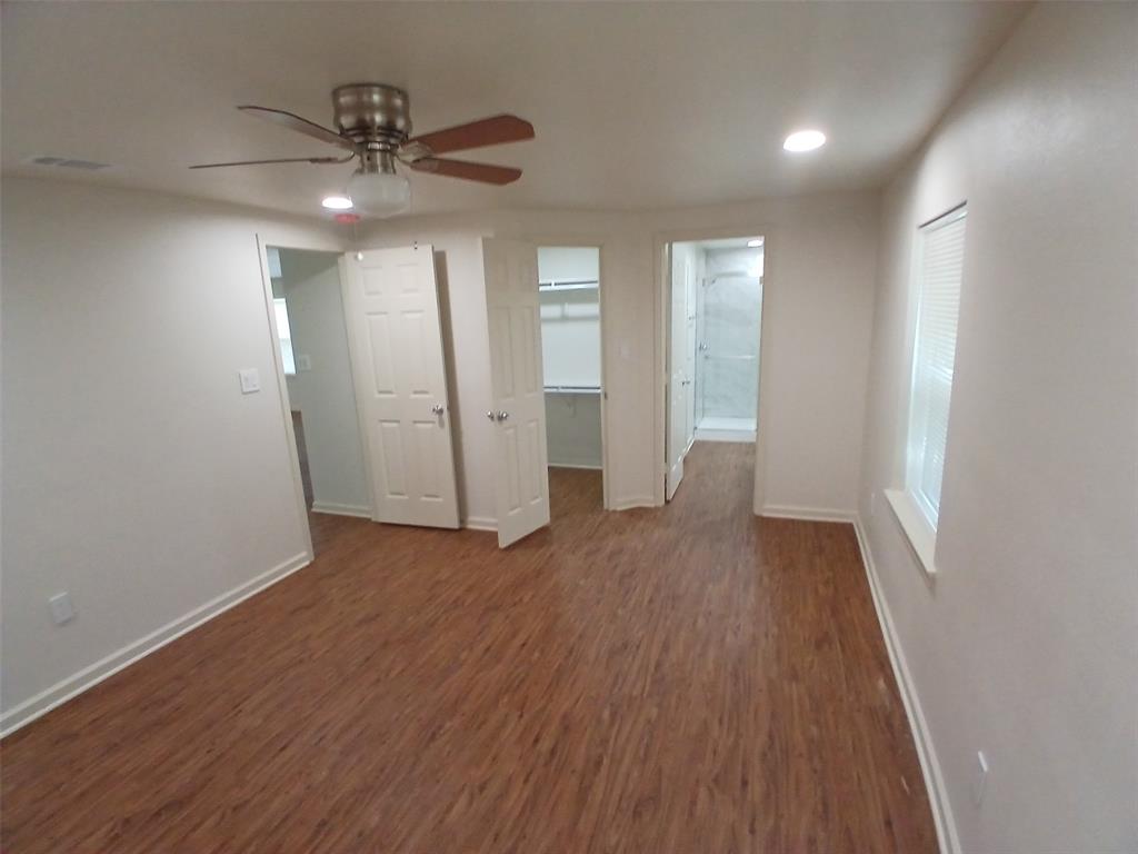 503 Windmere Circle Corinth, TX 76210 - Photo 5 of 20 Primary Suite featuring dark wood-style floors, a ceiling fan, and recessed lighting