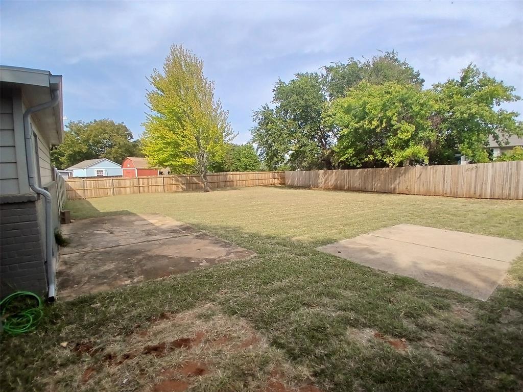 503 Windmere Circle Corinth, TX 76210 - Photo 10 of 20 Fenced backyard featuring a patio