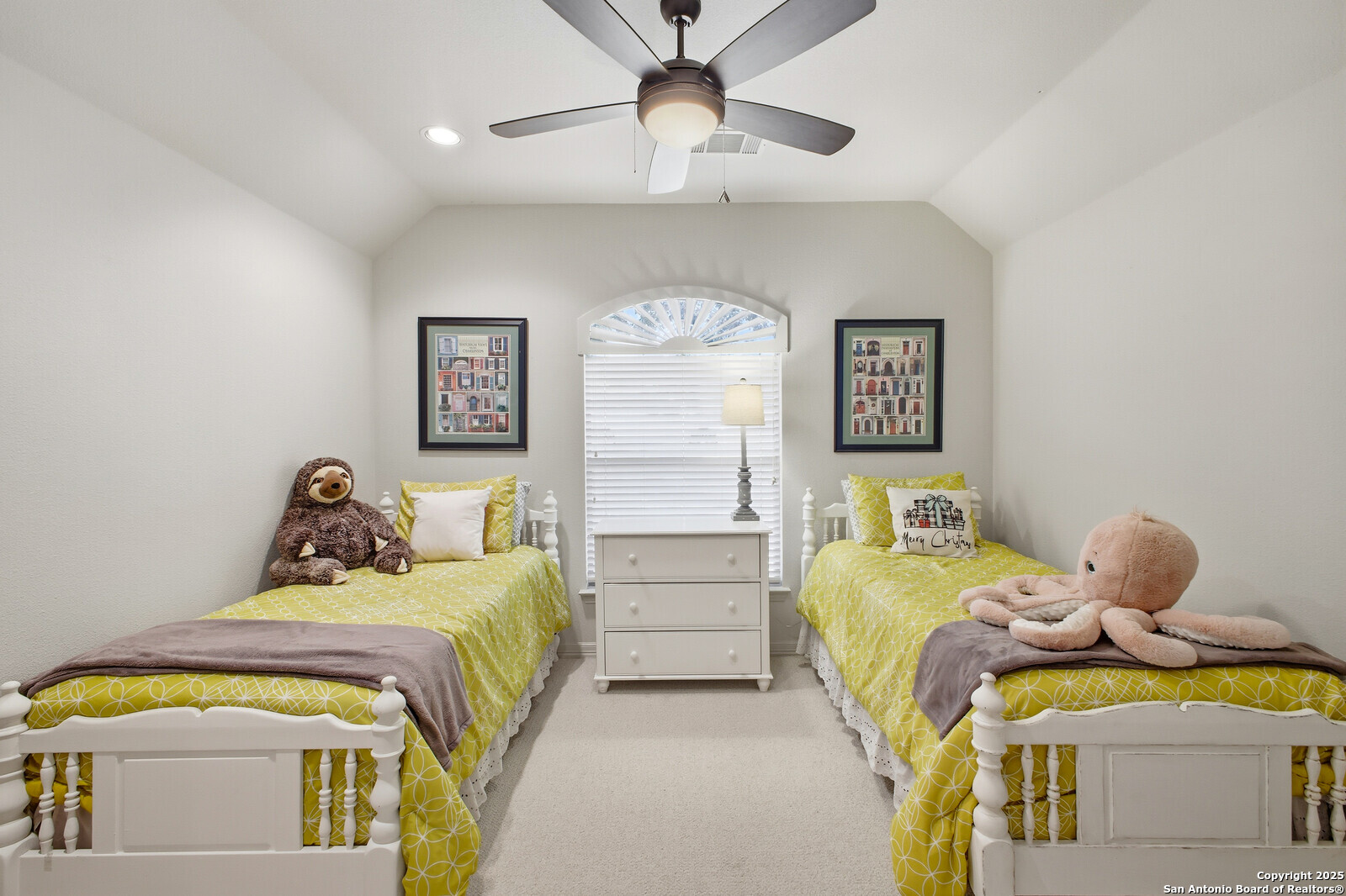 25523 River Ranch San Antonio, TX 78255 - Photo 15 of 45 a bedroom with two bed and a chandelier