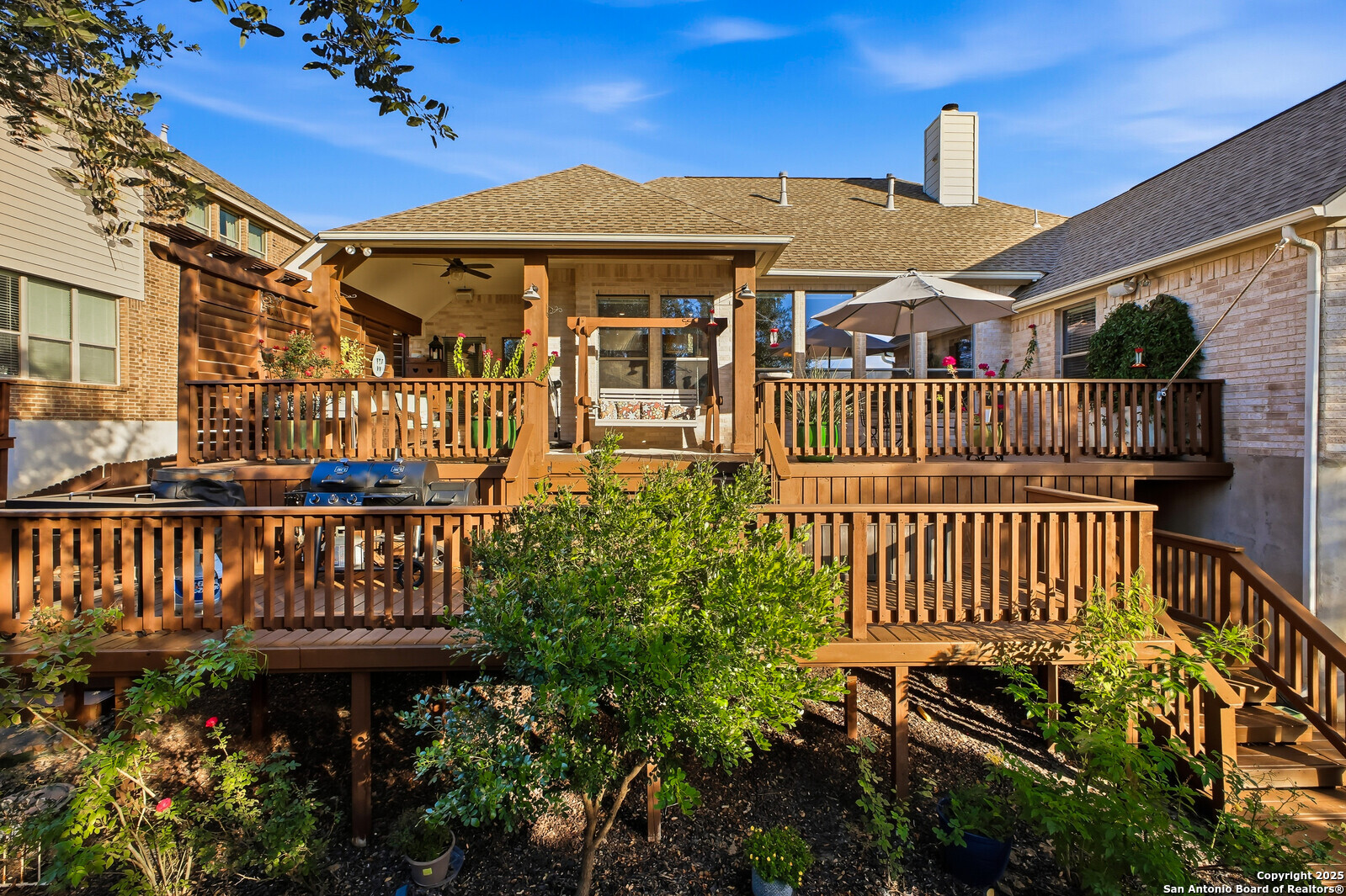 25523 River Ranch San Antonio, TX 78255 - Photo 17 of 45 a front view of a house with garden
