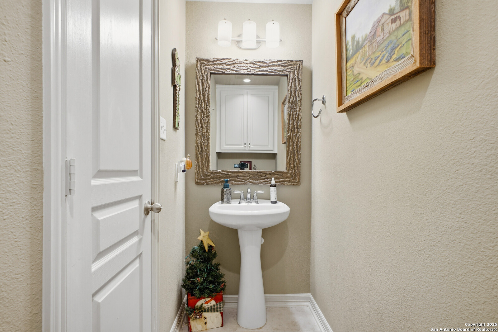 25523 River Ranch San Antonio, TX 78255 - Photo 18 of 41 a bathroom with a sink and a mirror