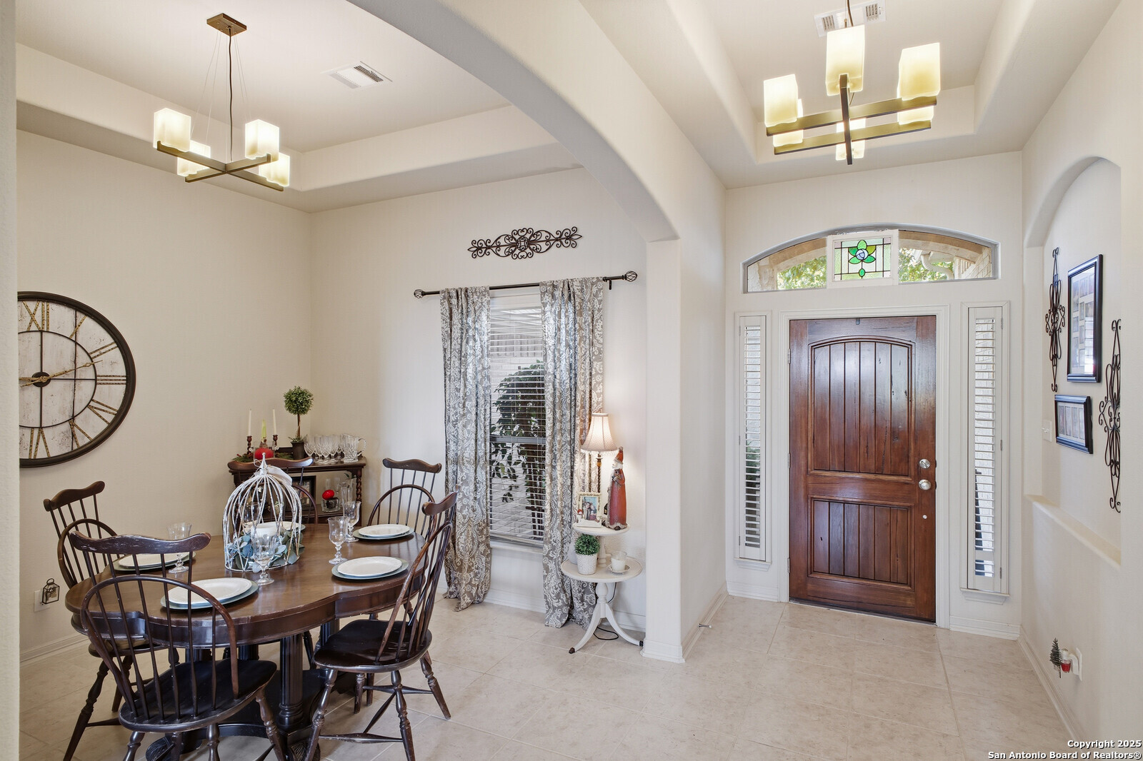 25523 River Ranch San Antonio, TX 78255 - Photo 2 of 45 a view of a dining room with furniture and a chandelier
