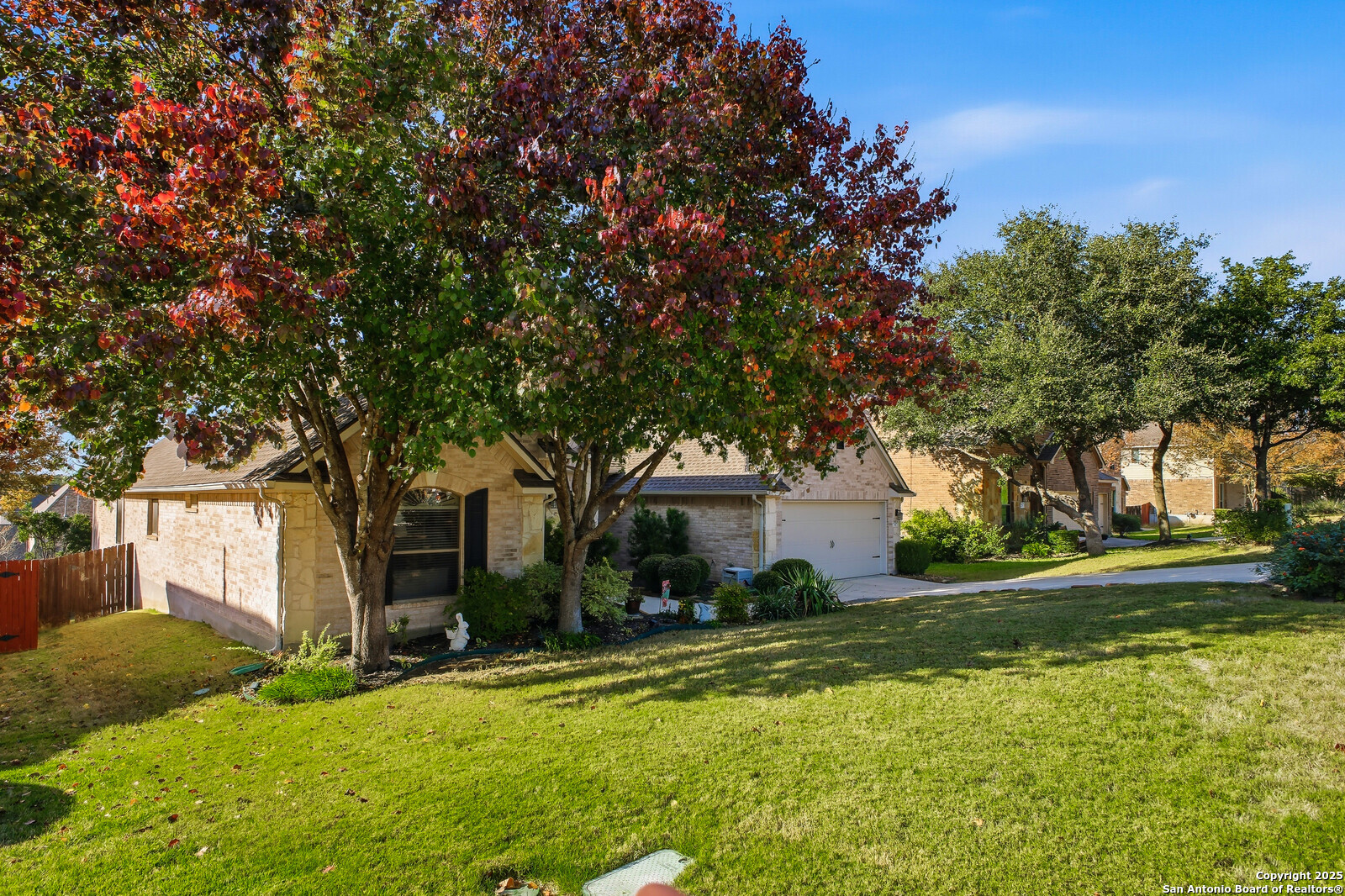 25523 River Ranch San Antonio, TX 78255 - Photo 21 of 41 a view of a house with a yard and tree s