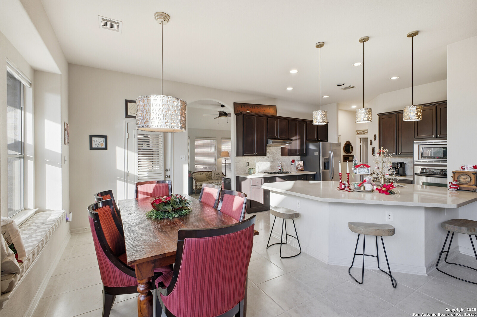 25523 River Ranch San Antonio, TX 78255 - Photo 3 of 45 a view of a dining room and furniture window and wooden floor
