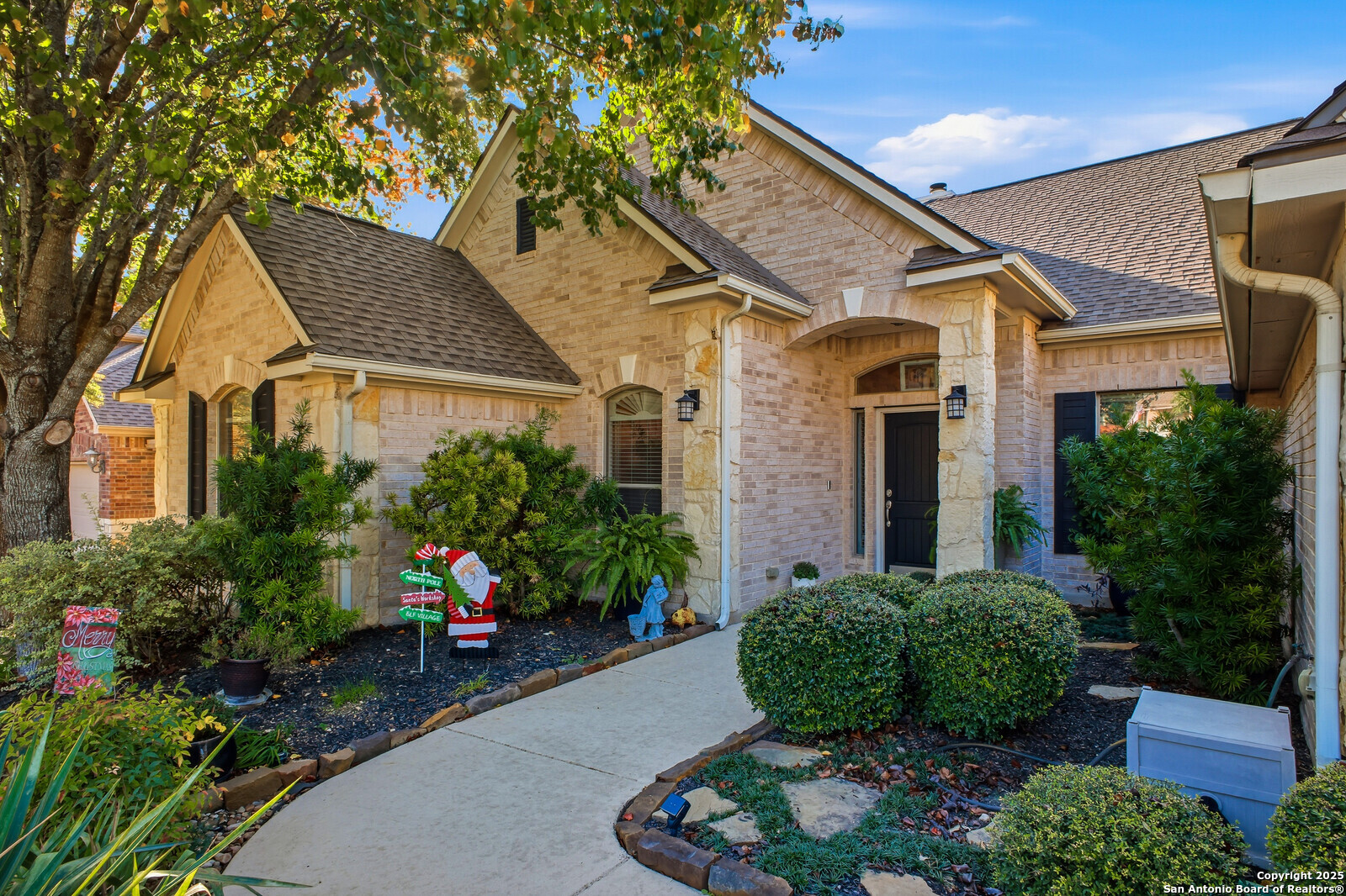 25523 River Ranch San Antonio, TX 78255 - Photo 31 of 45 a front view of a house with garden