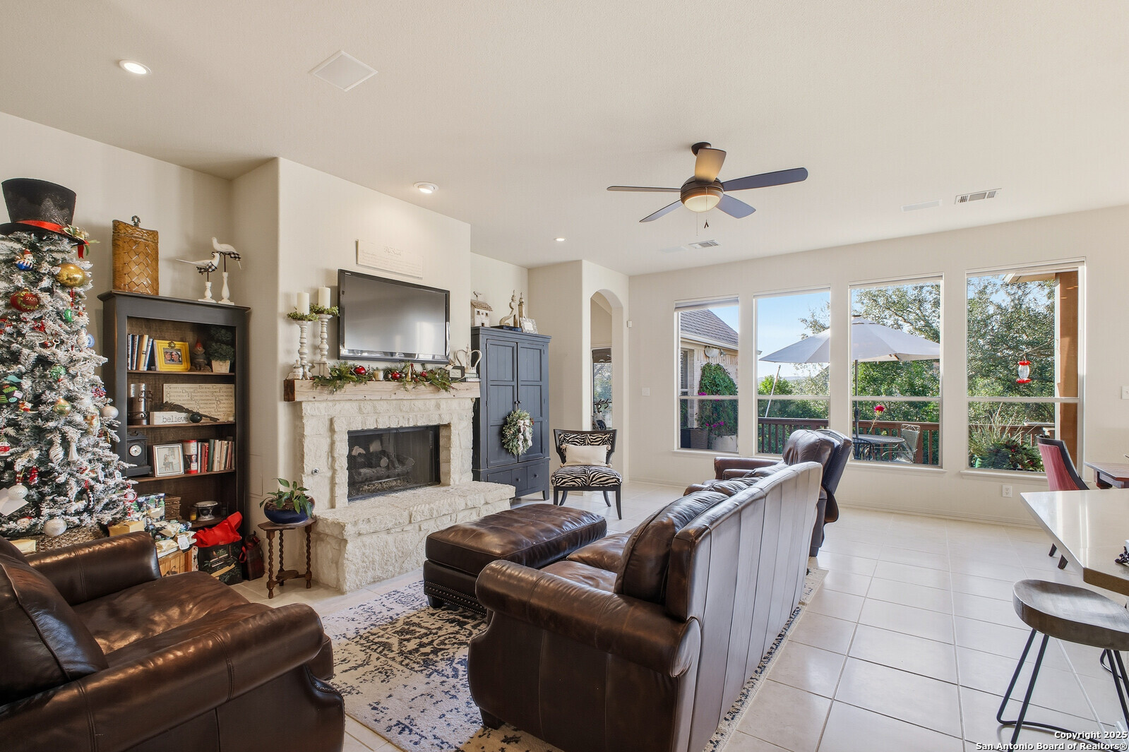 25523 River Ranch San Antonio, TX 78255 - Photo 32 of 45 a living room with fireplace furniture and a large window