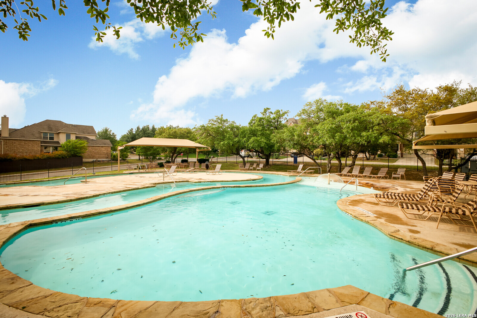 25523 River Ranch San Antonio, TX 78255 - Photo 38 of 41 a view of swimming pool with outdoor seating and trees in the background