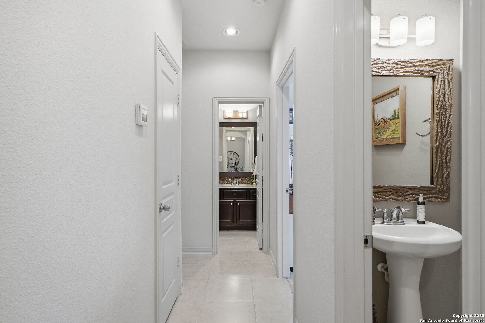 25523 River Ranch San Antonio, TX 78255 - Photo 40 of 45 a bathroom with a sink a toilet and shower