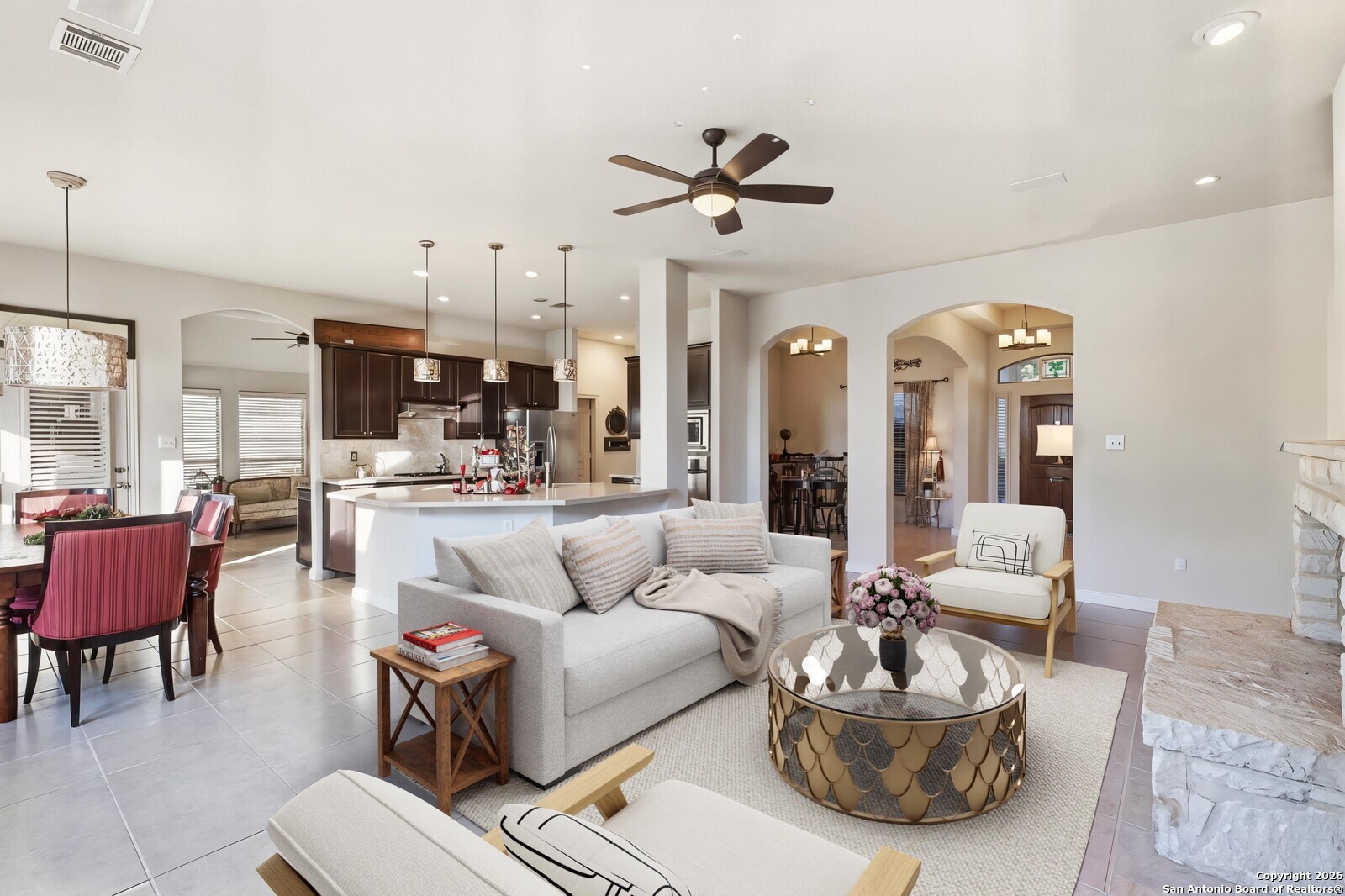 25523 River Ranch San Antonio, TX 78255 - Photo 5 of 45 a living room with furniture kitchen view and a chandelier