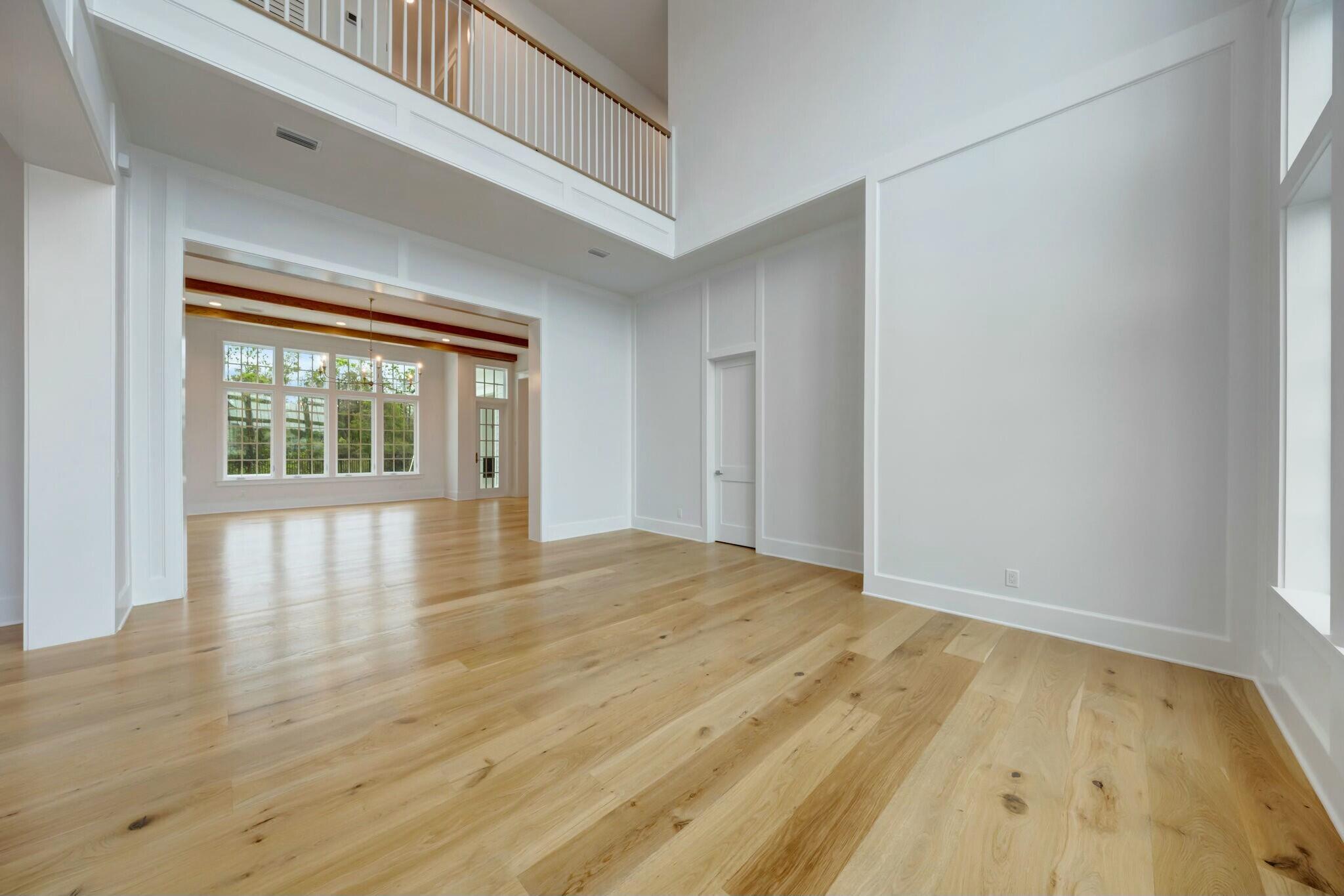 287 Golf Ridge Dr Inlet Beach Inlet Beach, FL 32461 - Photo 11 of 97 a view of an empty room with wooden floor and a window