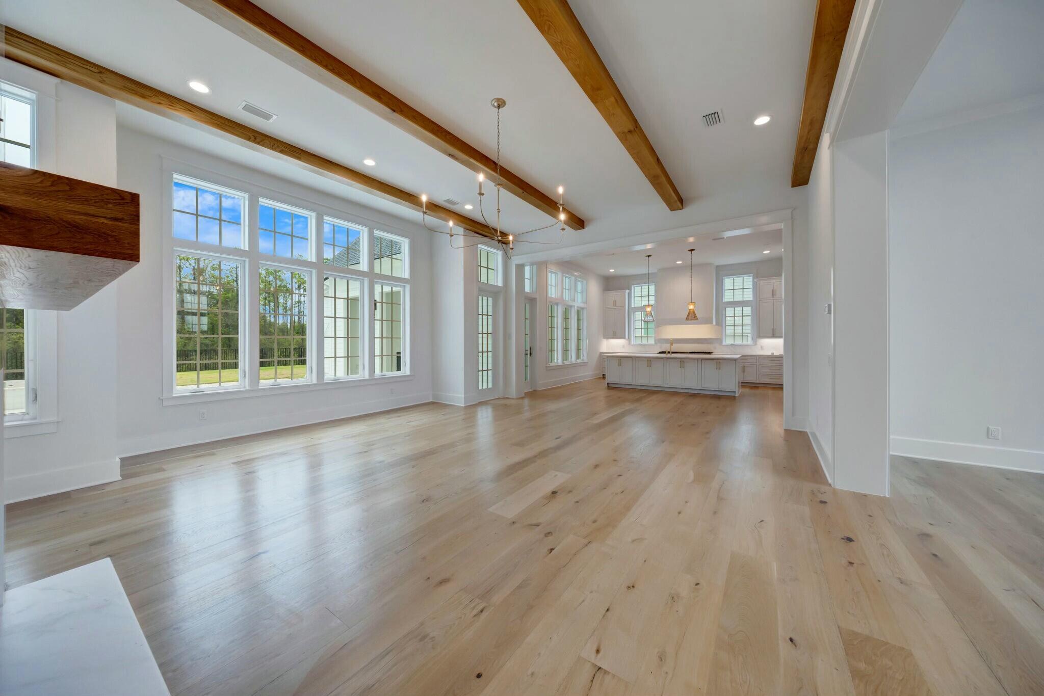 287 Golf Ridge Dr Inlet Beach Inlet Beach, FL 32461 - Photo 13 of 97 a view of an empty room with wooden floor and a window