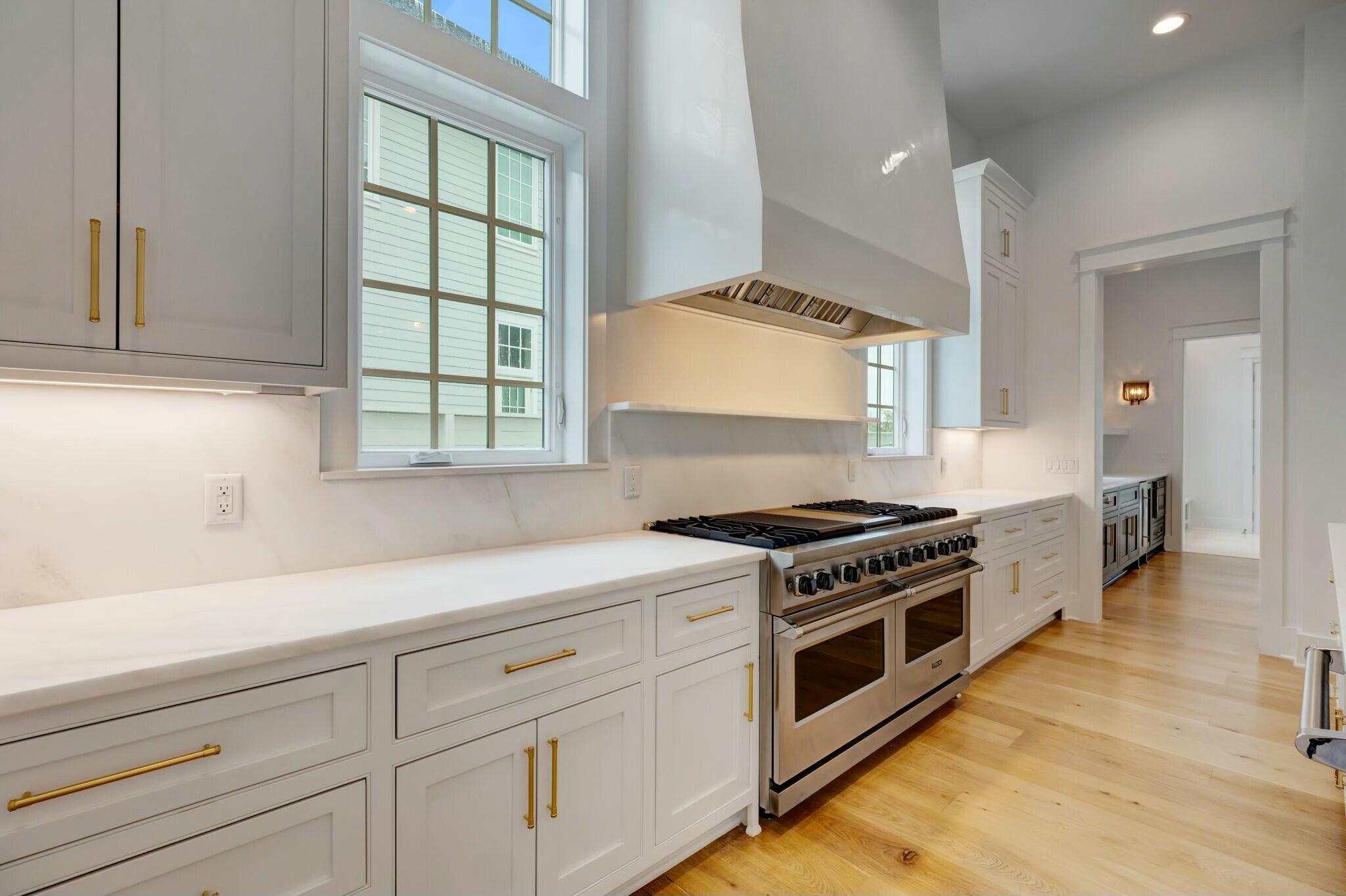 287 Golf Ridge Dr Inlet Beach Inlet Beach, FL 32461 - Photo 19 of 97 a kitchen with stainless steel appliances white cabinets and a stove