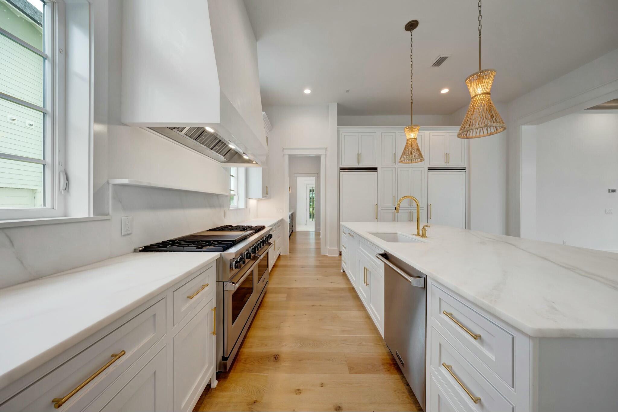287 Golf Ridge Dr Inlet Beach Inlet Beach, FL 32461 - Photo 21 of 97 a large kitchen with granite countertop a stove and a sink