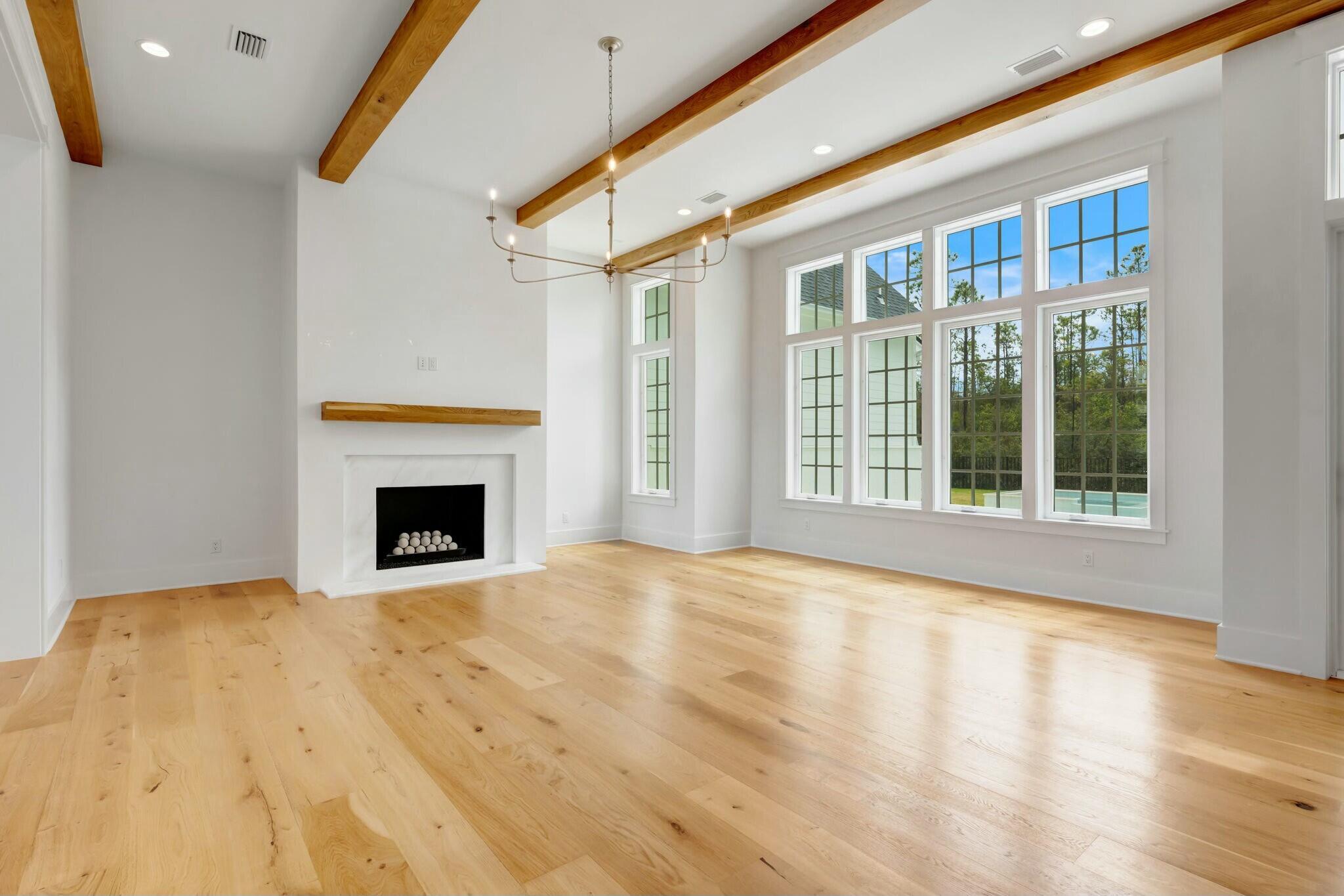 287 Golf Ridge Dr Inlet Beach Inlet Beach, FL 32461 - Photo 32 of 97 a view of empty room with wooden floor and fireplace