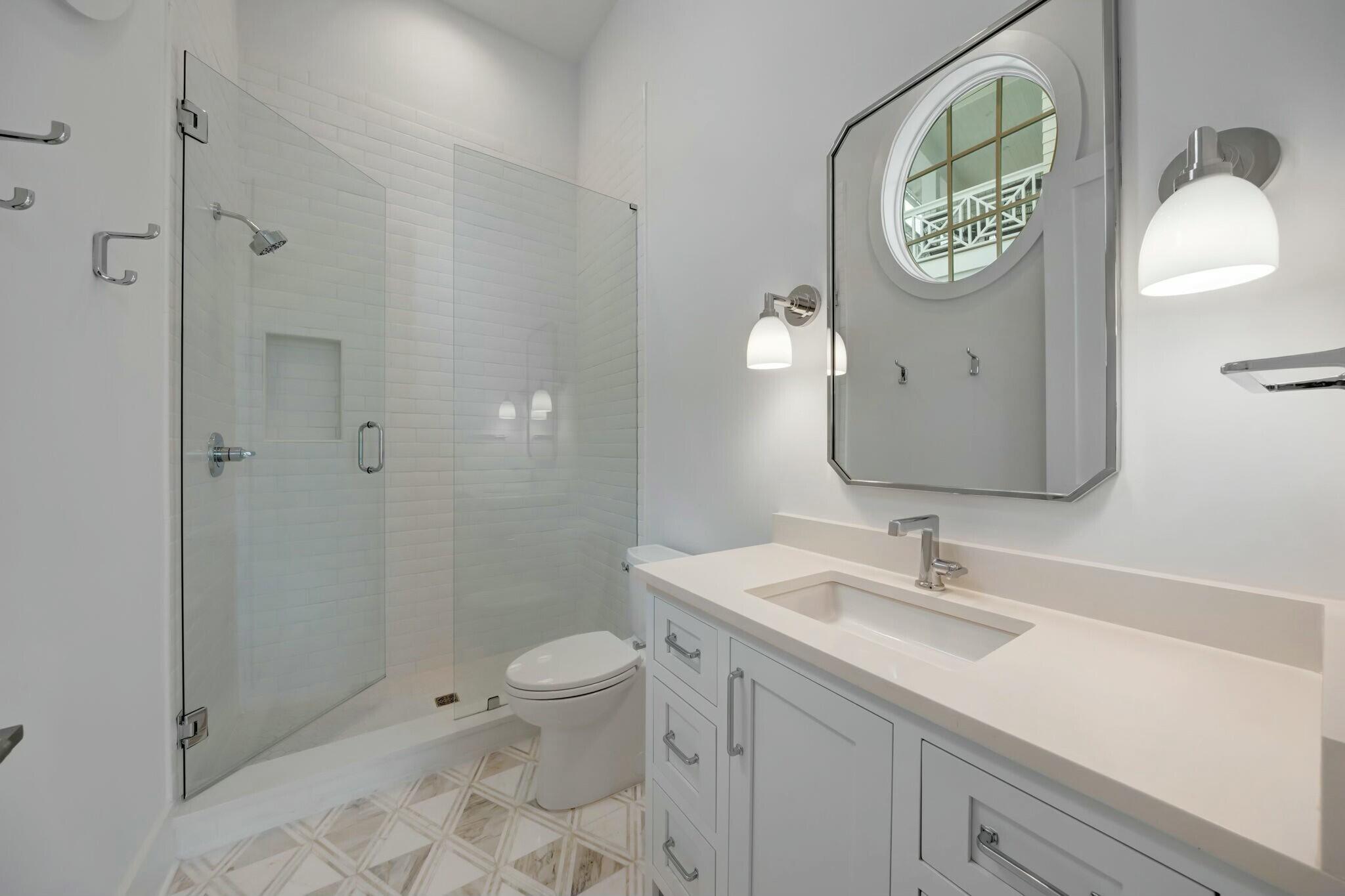 287 Golf Ridge Dr Inlet Beach Inlet Beach, FL 32461 - Photo 53 of 97 a bathroom with a toilet sink and mirror