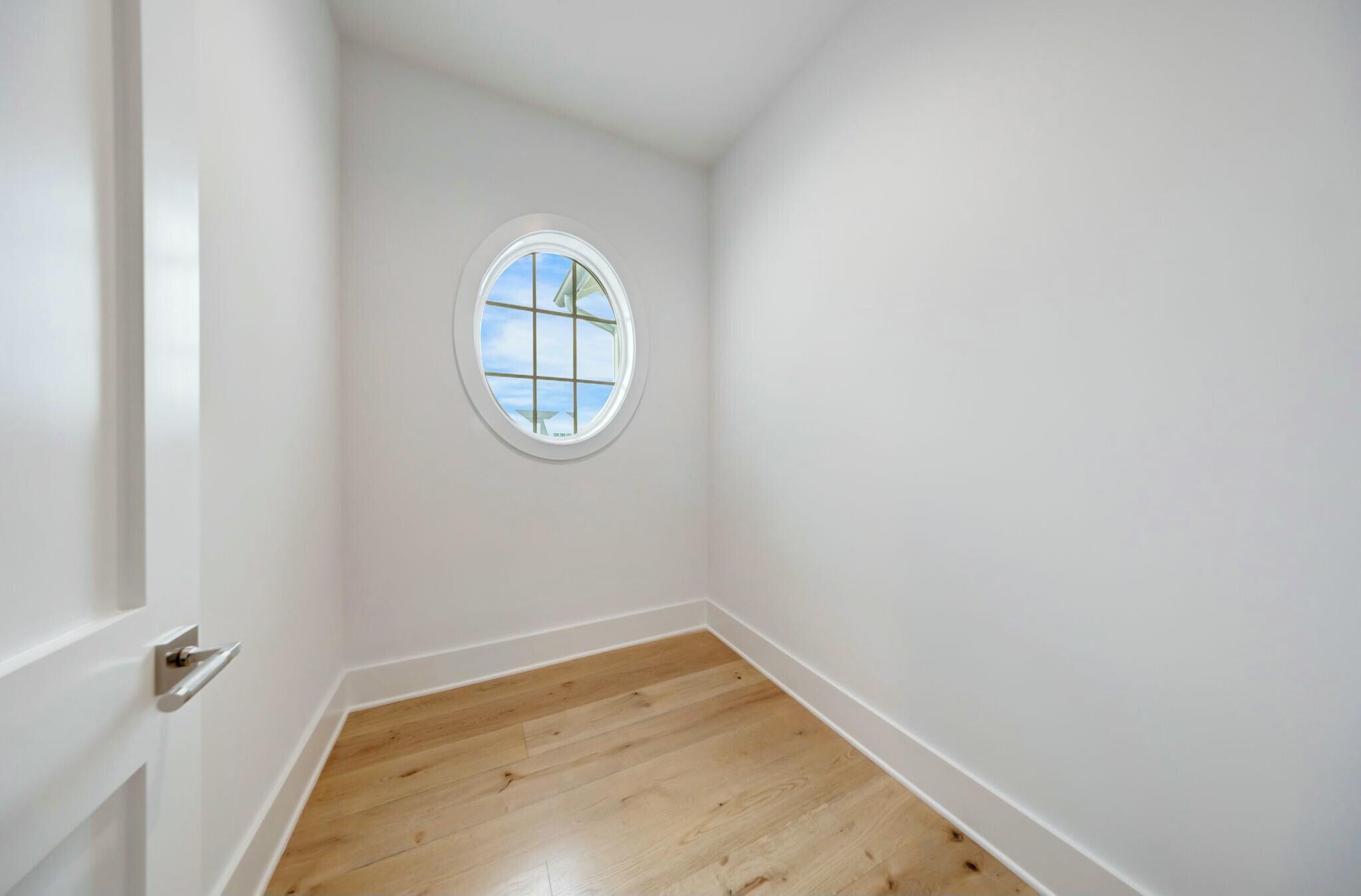 287 Golf Ridge Dr Inlet Beach Inlet Beach, FL 32461 - Photo 62 of 97 a view of a room with wooden floor and a window