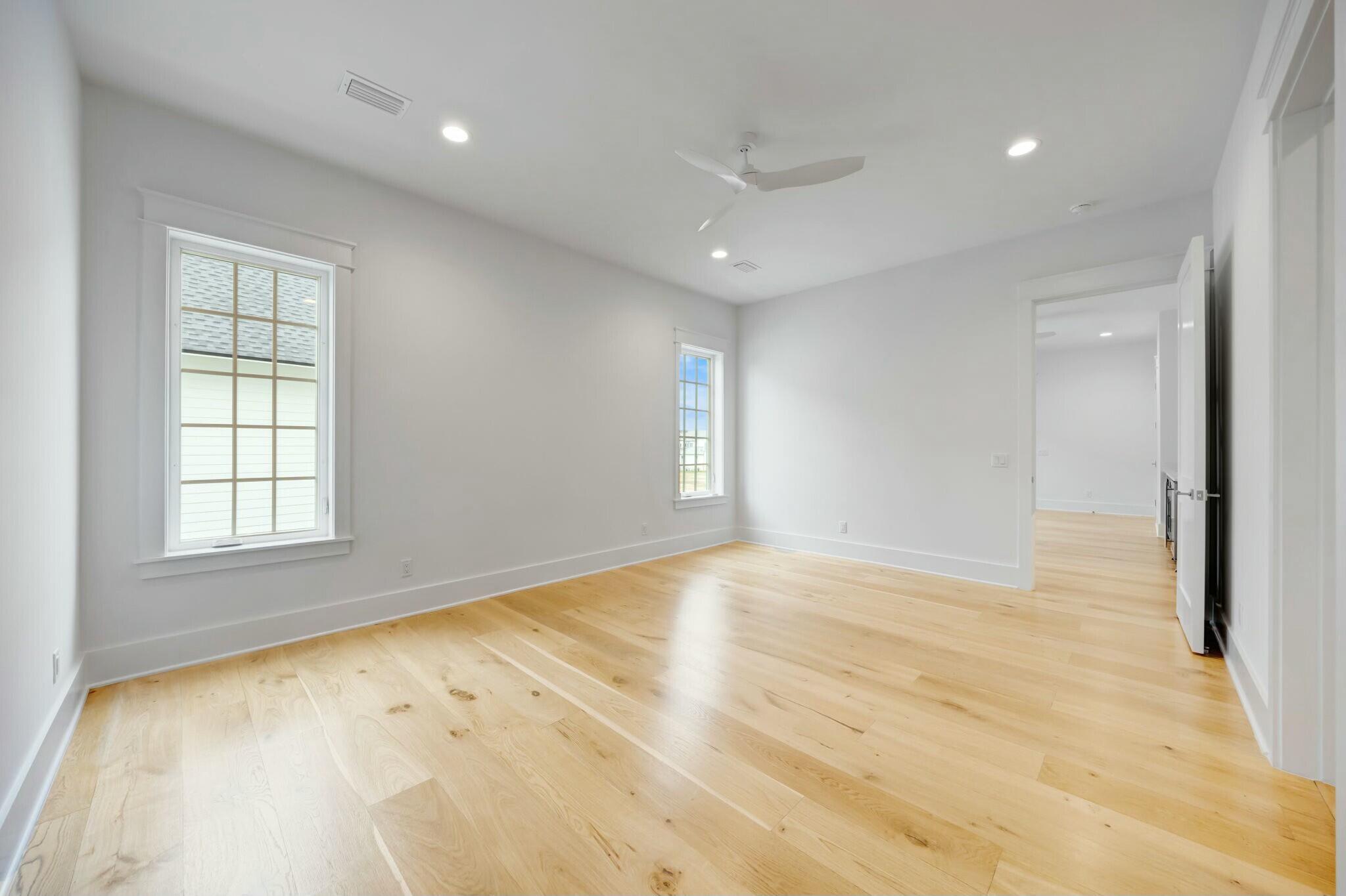 287 Golf Ridge Dr Inlet Beach Inlet Beach, FL 32461 - Photo 73 of 97 an empty room with wooden floor and windows