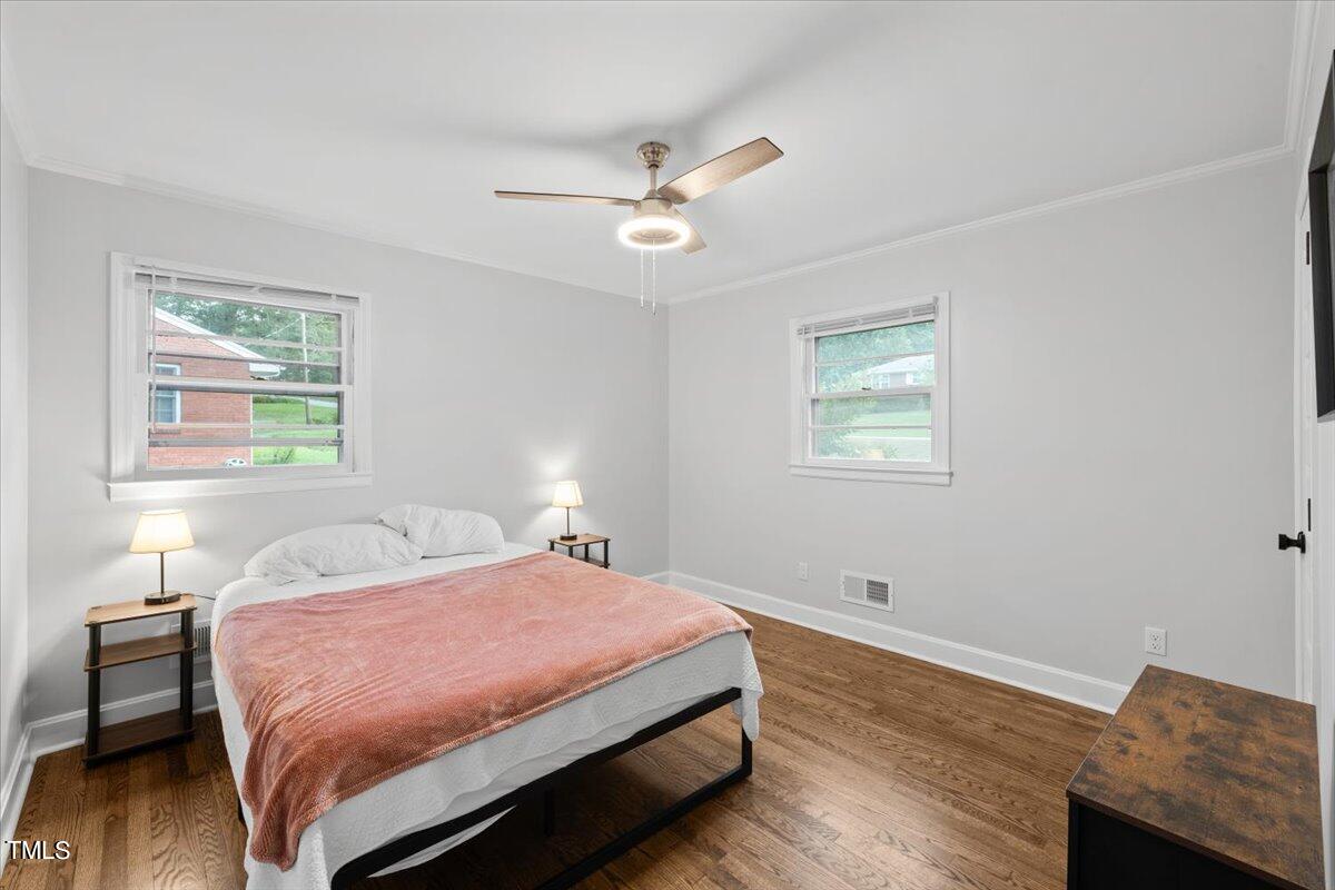 4312 James Road Raleigh, NC 27616 - Photo 30 of 44 a bedroom with a bed and a window