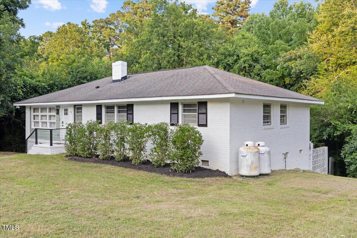 4312 James Road Raleigh, NC 27616 - Photo 3 of 44 a house with trees in the background