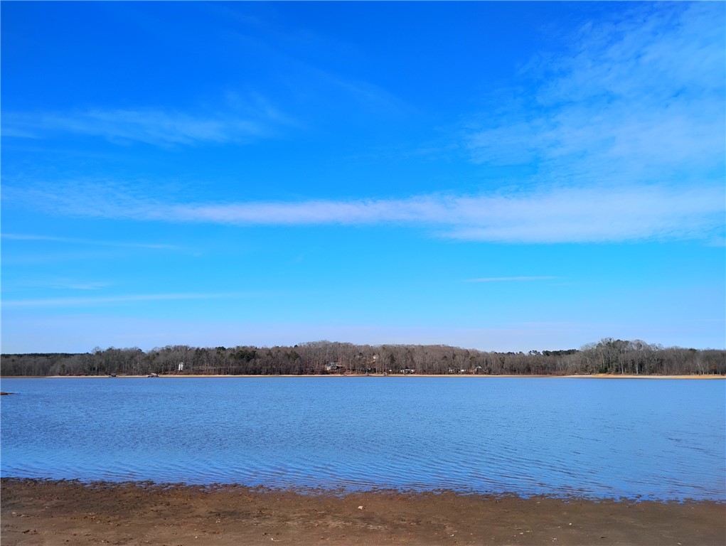 3400 Old Dobbins Bridge Road Fair Play, SC 29643 - Photo 25 of 50 This tranquil waterfront setting offers expansive views of the lake and surrounding natural landscape.