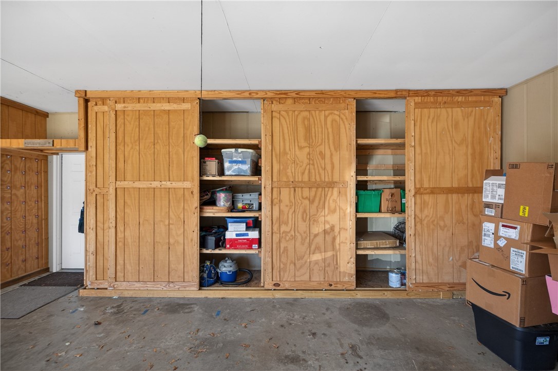 3400 Old Dobbins Bridge Road Fair Play, SC 29643 - Photo 32 of 50 This garage offers convenient built-in shelving, providing ample storage and organization for all your needs.