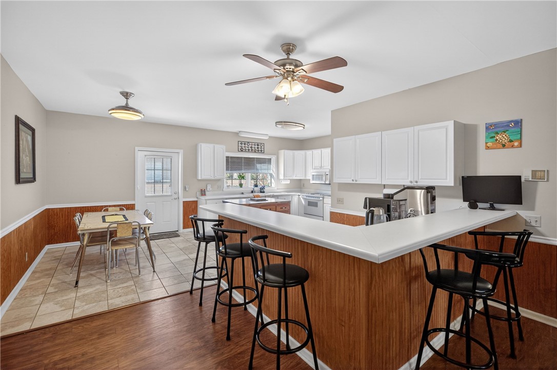 3400 Old Dobbins Bridge Road Fair Play, SC 29643 - Photo 4 of 50 This spacious kitchen offers a functional layout, with ample counter space and convenient dining areas.