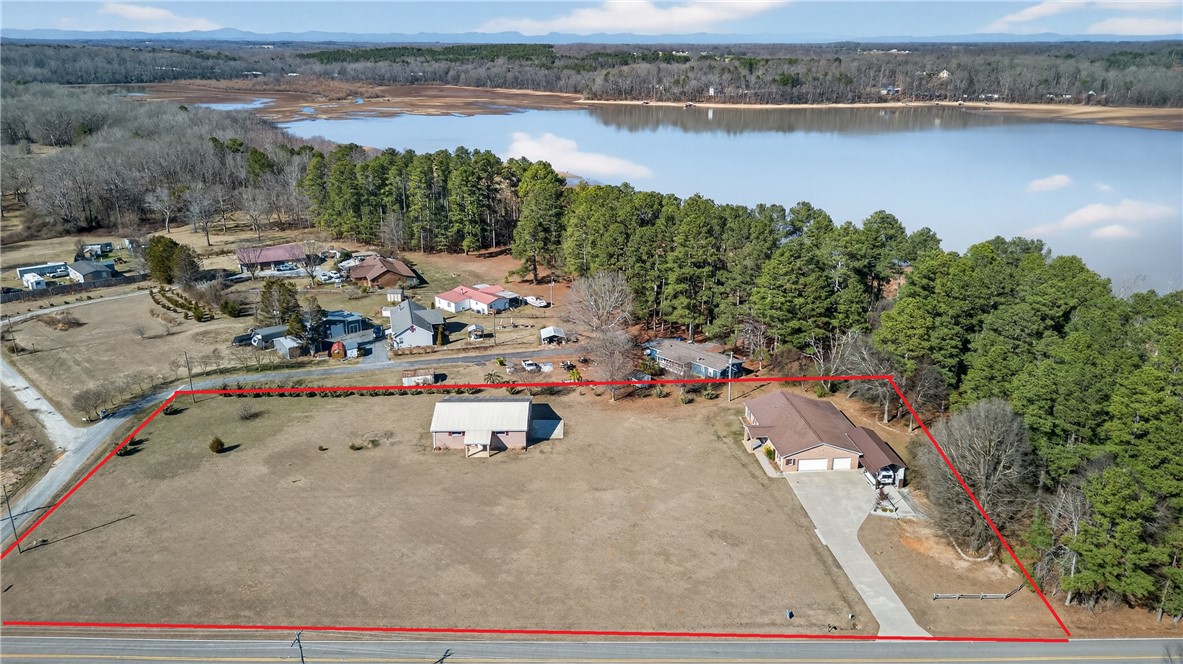 3400 Old Dobbins Bridge Road Fair Play, SC 29643 - Photo 44 of 50 This aerial view showcases a waterfront property with expansive views and ample outdoor space.