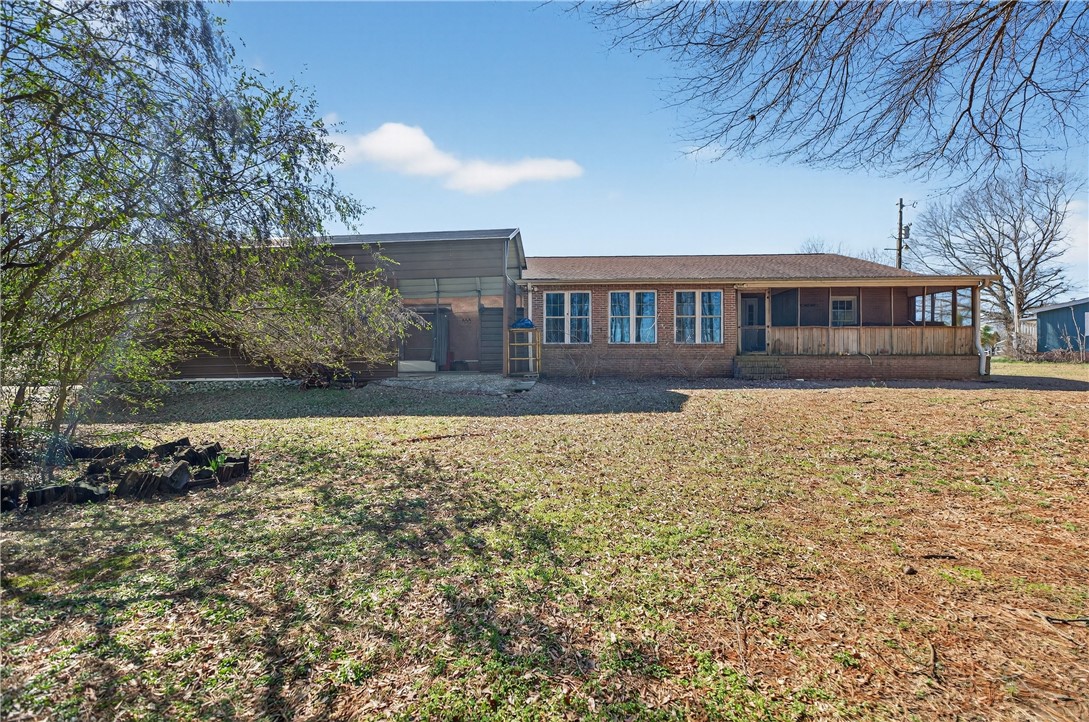 3400 Old Dobbins Bridge Road Fair Play, SC 29643 - Photo 48 of 50 This ranch-style home features an expansive yard and a welcoming screened porch, perfect for outdoor living.