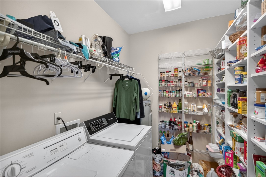 3400 Old Dobbins Bridge Road Fair Play, SC 29643 - Photo 50 of 50 This practical utility room features convenient storage solutions and laundry appliances.